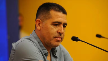 Román en la conferencia.