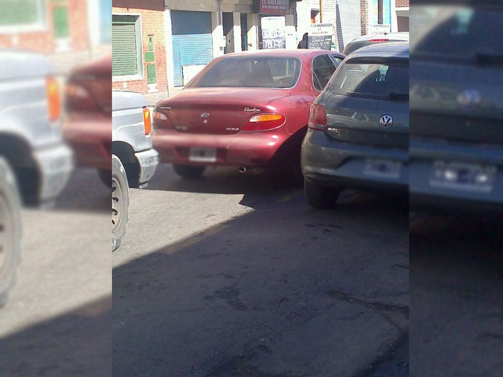 Vehículos estacionados en la parada