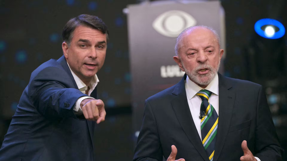 Lula da Silva y Flávio Bolsonaro se miden en el último debate televisado