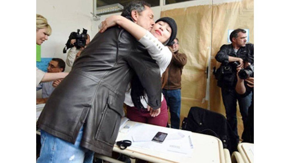 El beso de Scioli