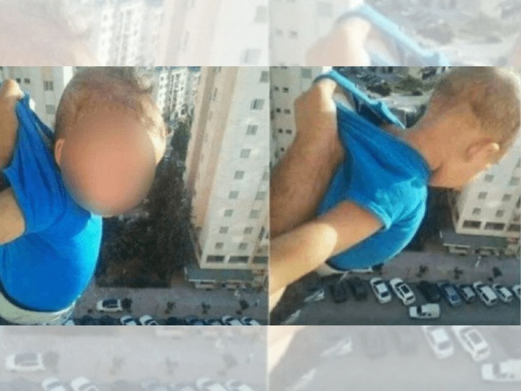 Niño a punto de ser arrojado