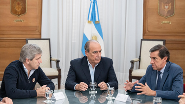 Carlos Sadir con Guillermo Franco y Luis Caputo.
