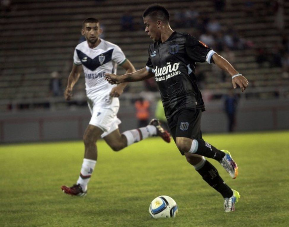 Racing ganó