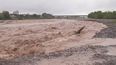 preocupacion de vecinos de chijra por la crecida del rio grande tras las fuertes tormentas