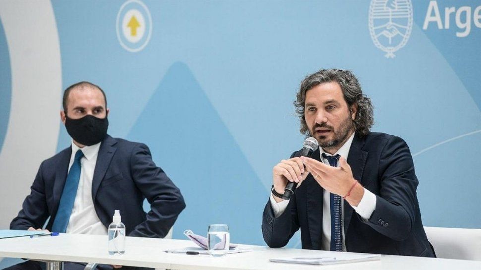 El jefe de Gabinete, Santiago Cafiero, y el ministro Martín Guzmán.