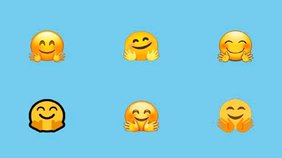 WhatsApp emoji de la carita con las manos abiertas