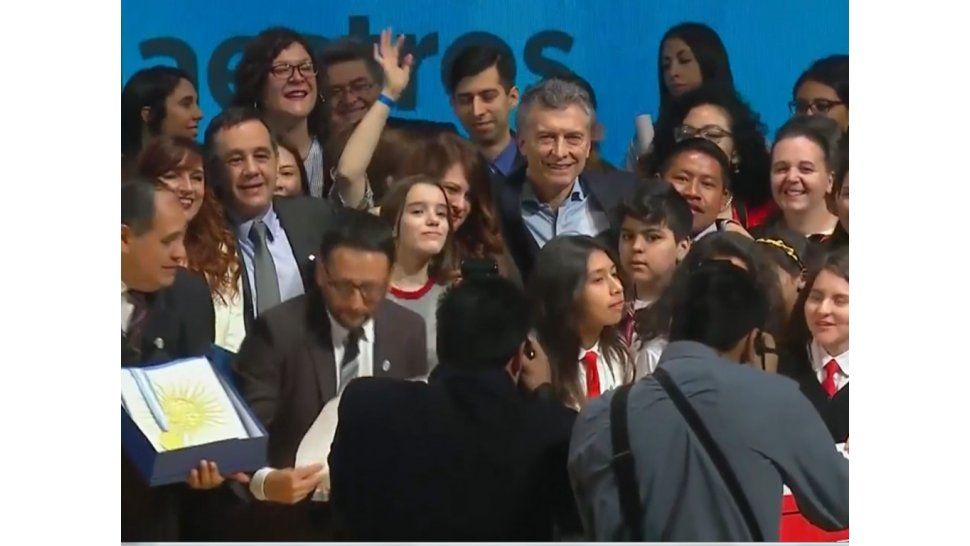 Los ganadores con el Presidente