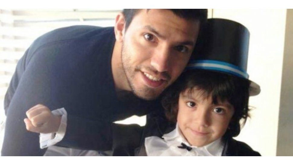 Aguero y su hijo