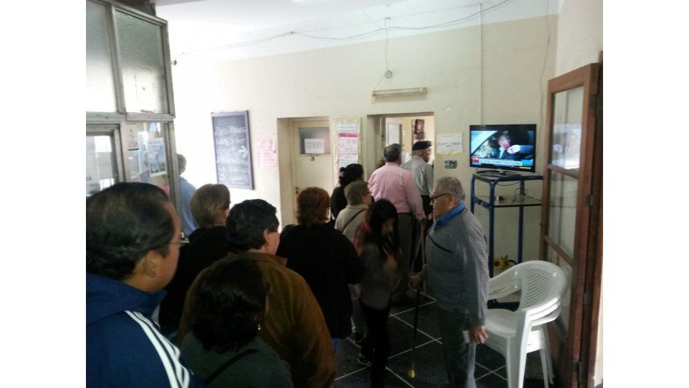 Colas para obtener los pases libres