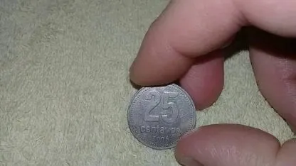 Moneda de 25 centavos.